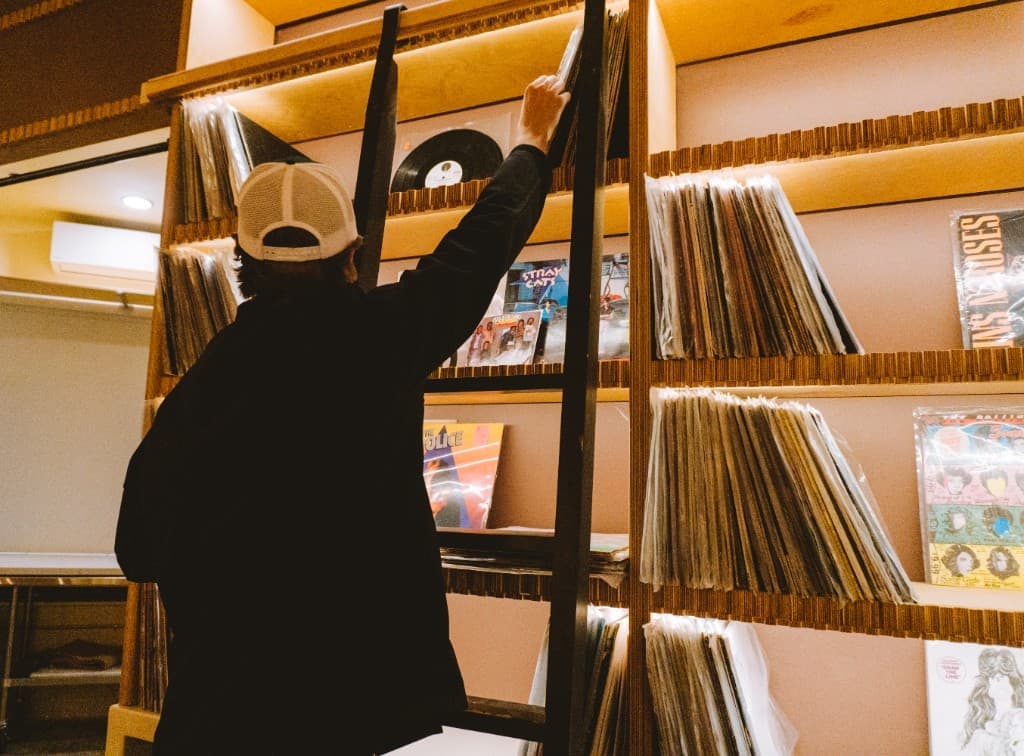 Browsing vinyl records at The Analogue Room vinyl lounge in Solvang