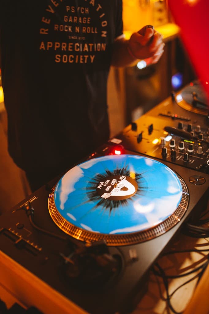 Blue marble vinyl spinning on a turntable at The Analogue Room vinyl lounge in Solvang