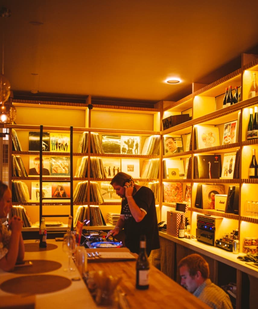DJ spinning records at The Analogue Room bar and vinyl lounge in Solvang
