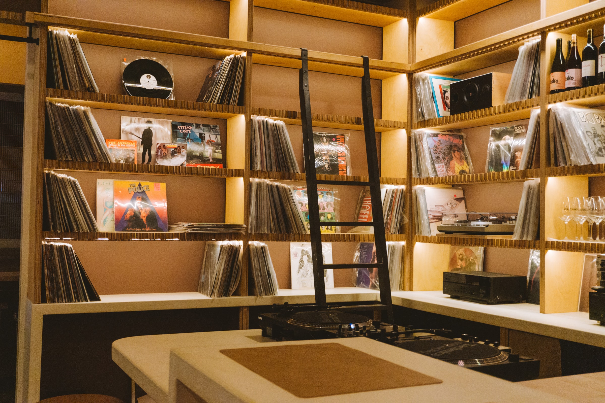 Vinyl record wall inside Analogue Room listening lounge in Solvang